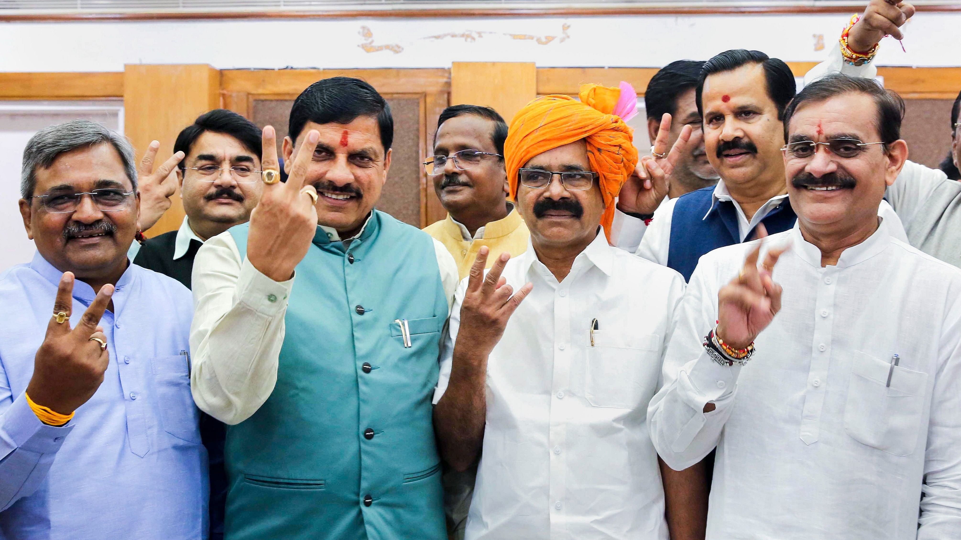 <div class="paragraphs"><p>Madhya Pradesh Chief Minister Mohan Yadav and State BJP President V.D. Sharma with BJP leader George Kurian after the latter filed his nomination papers as party's Rajya Sabha candidate from the state, in Bhopal, Wednesday.</p></div>